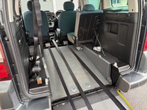 Winch and safety straps for wheelchair