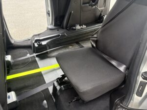 Sit next to wheelchair user 